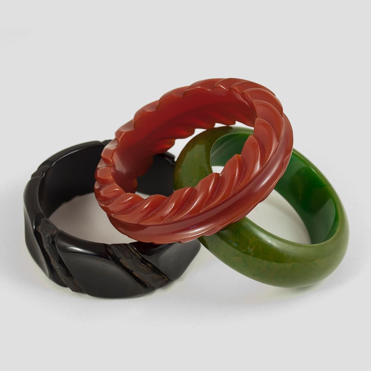 Molded Three Early to Mid-20th Century Bakelite Cuff Bracelets For Sale