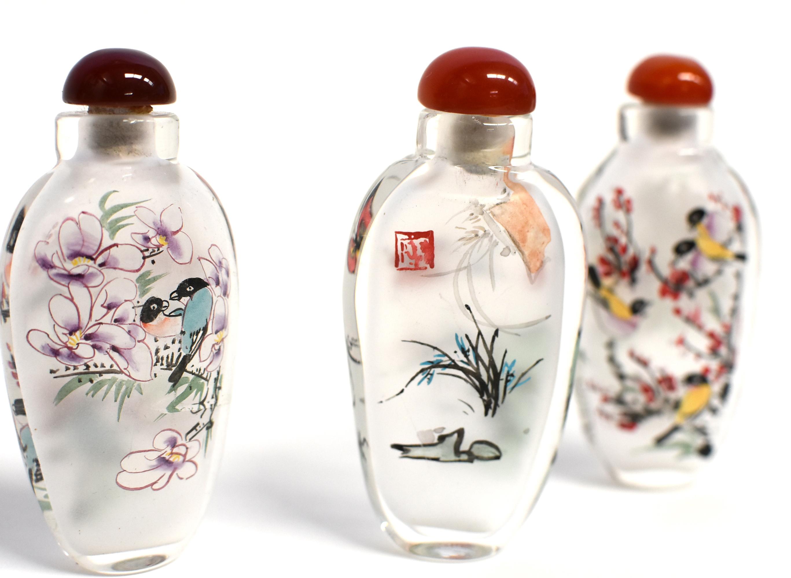 Three Églomisé Reverse Painted Snuff Bottles with Magnolia and Orchid For Sale 4