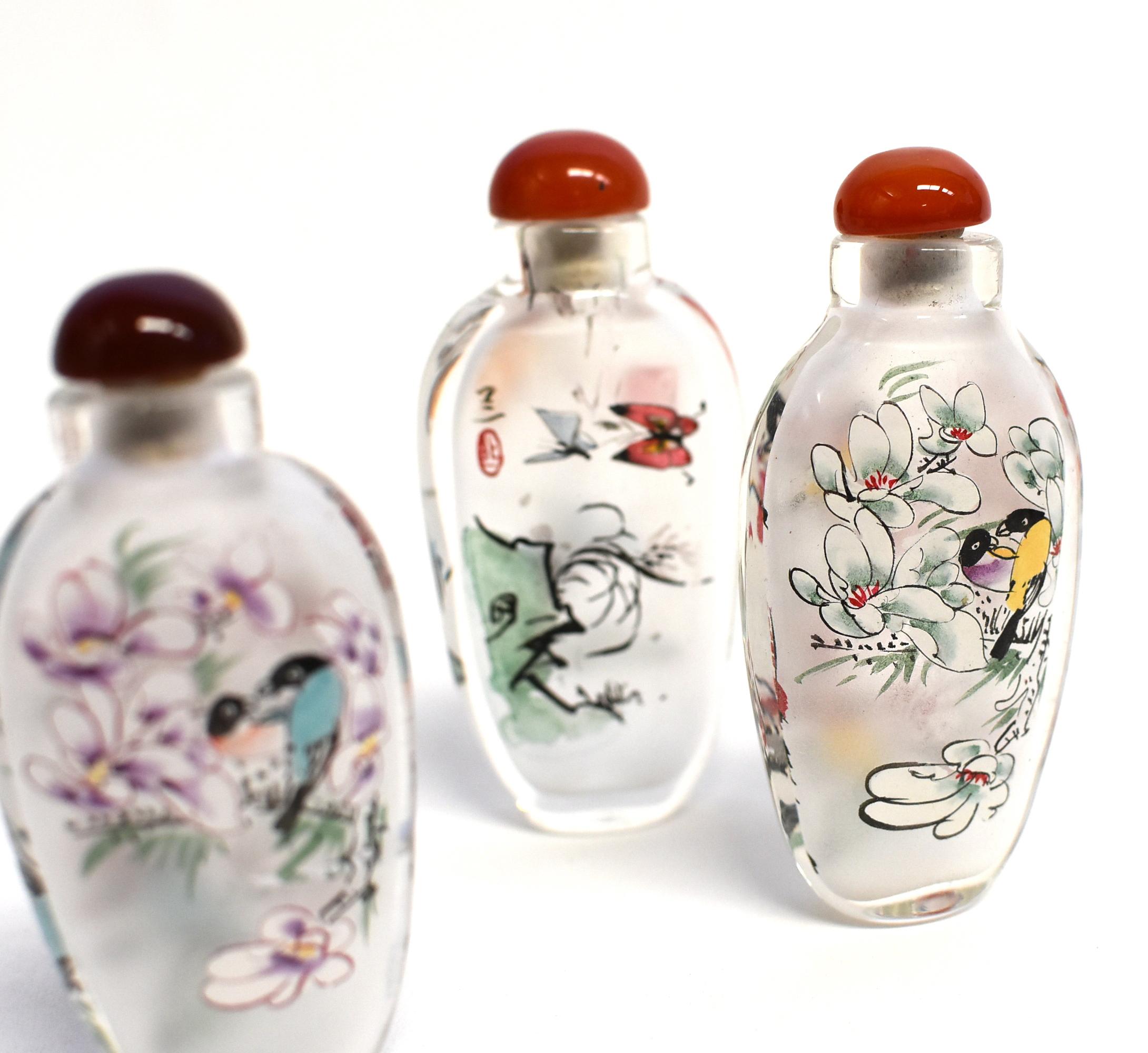 Three Églomisé Reverse Painted Snuff Bottles with Magnolia and Orchid For Sale 8