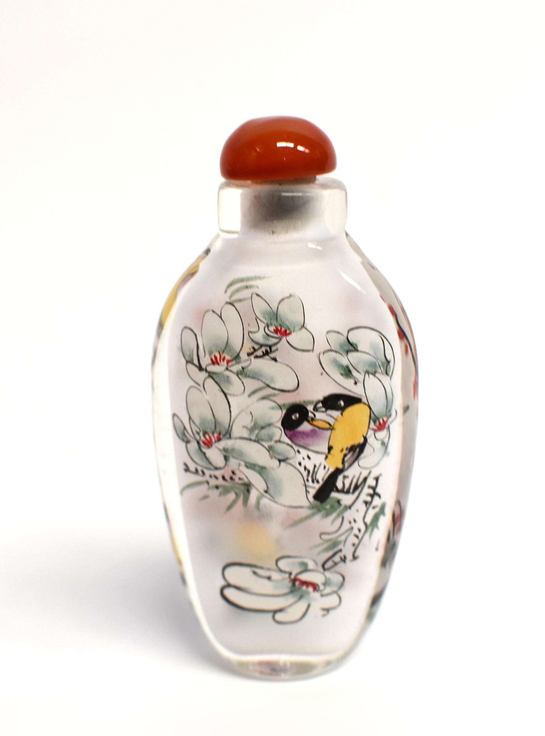 Three Églomisé Reverse Painted Snuff Bottles with Magnolia and Orchid For Sale 1