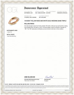 Three Eighteen Karat Tri Color Rolling Ring Band