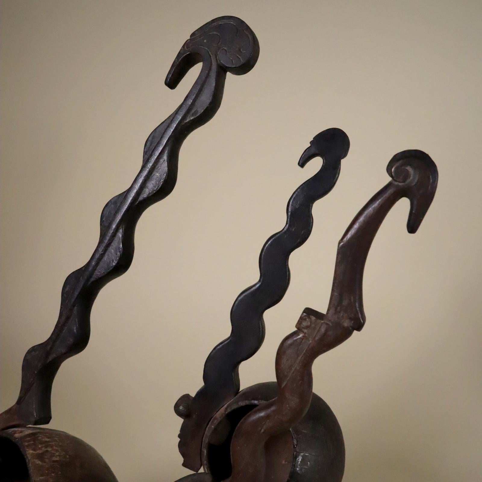 Store closing March 31. Last chance clearance sale.  Three elegant ceremonial holy water dippers. Serpentine, bird-headed wood handles with coconut bowls; the head of the handles are lightly incised with volutes. From Indonesia, not sure where,