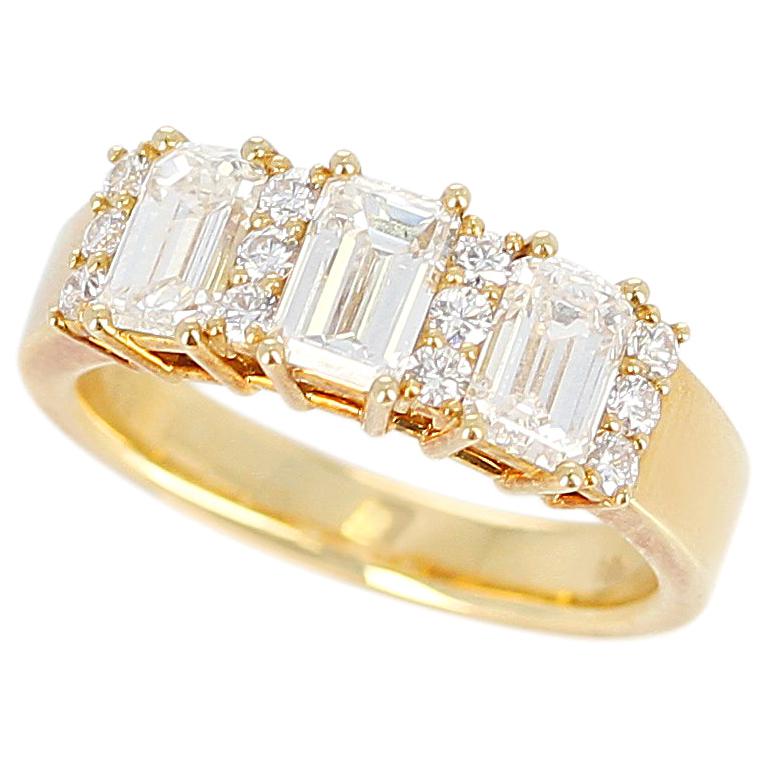 Three Emerald-Cut Diamond Wedding Ring with Round Diamonds, 18 Karat Yellow Gold For Sale