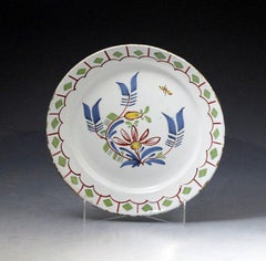 Three English Delftware Decorative Plates with Polychrome Colors