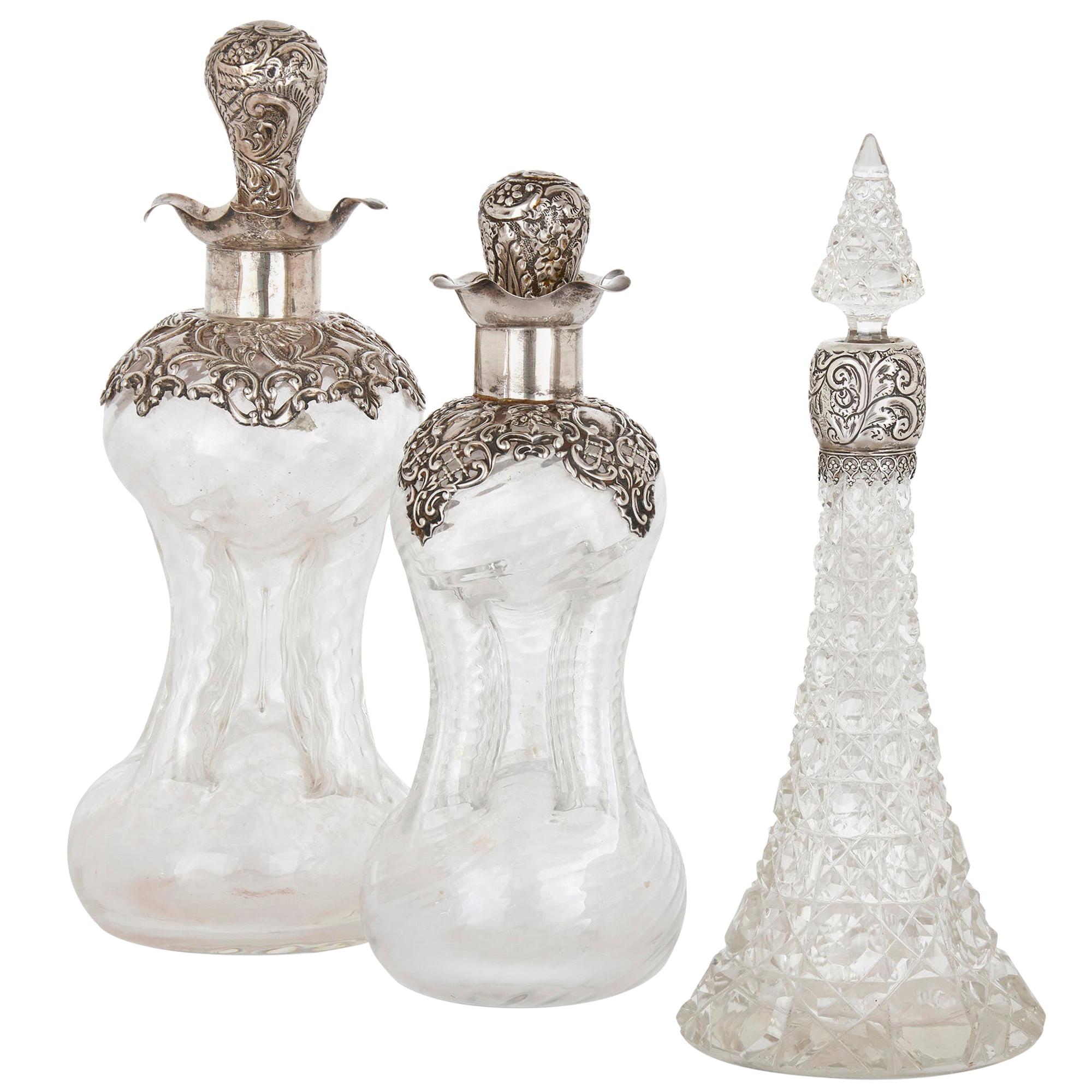 Three English Sterling Silver and Cut Glass Bottles For Sale