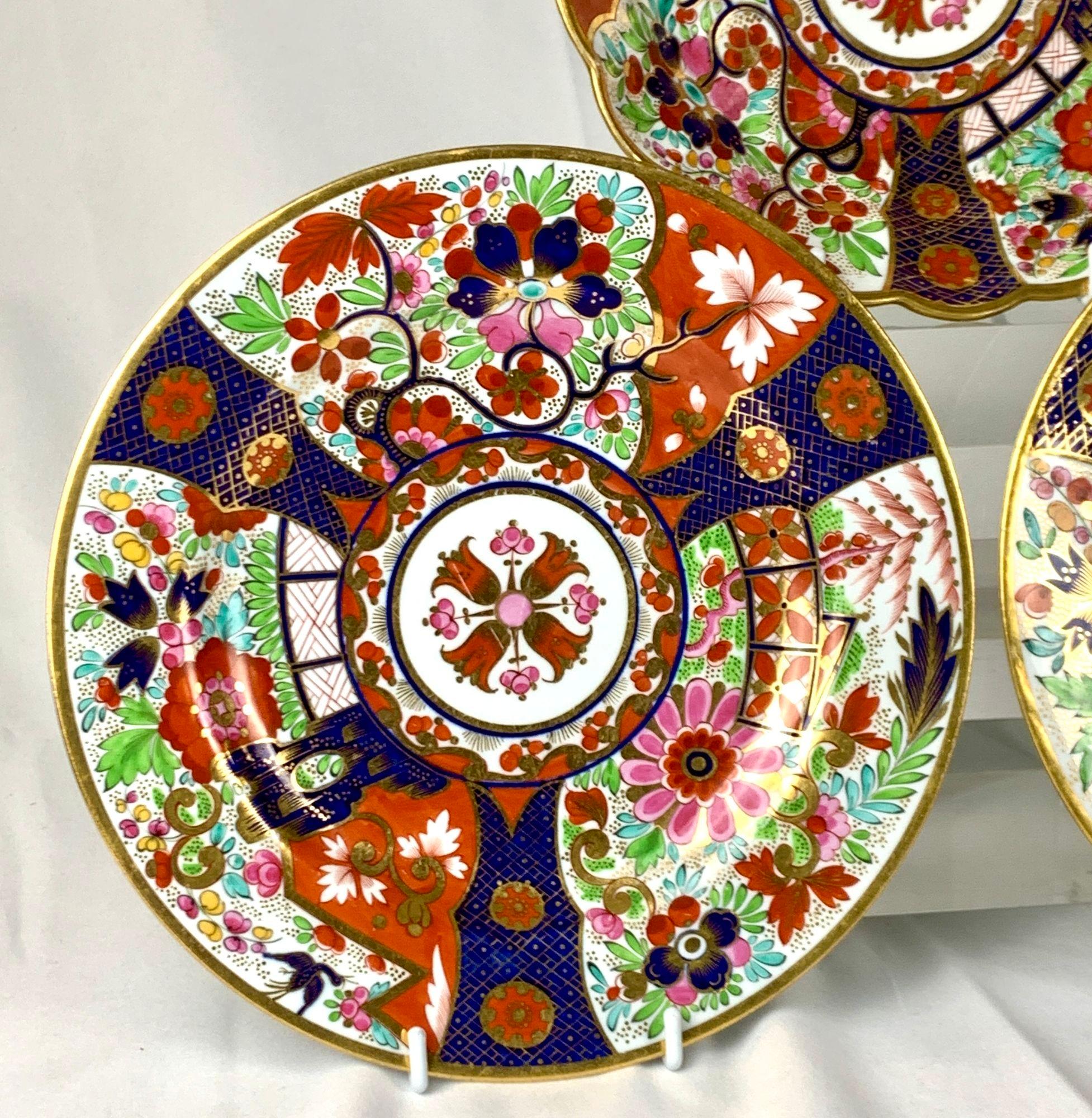 These three dishes were hand-painted circa 1800 in an Imari pattern created by Flight and Barr Worcester.
The design is exuberant, featuring large flowers, garden fences, rockwork, and a flying bird surrounding a central medallion.
The color