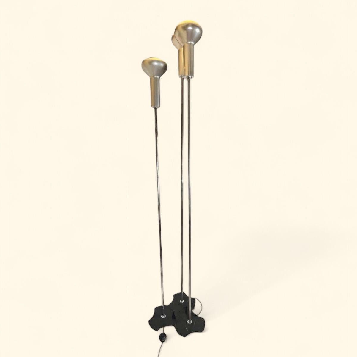 Three lamps model 1073/3 in steel, aluminum and cracked metal base, by Gino Sarfatti.

Prod. Arteluce, Italy, 1956.

Excellent condition. Some abrasion on the chrome stems as expected on a period piece.

The electrics are original and have been