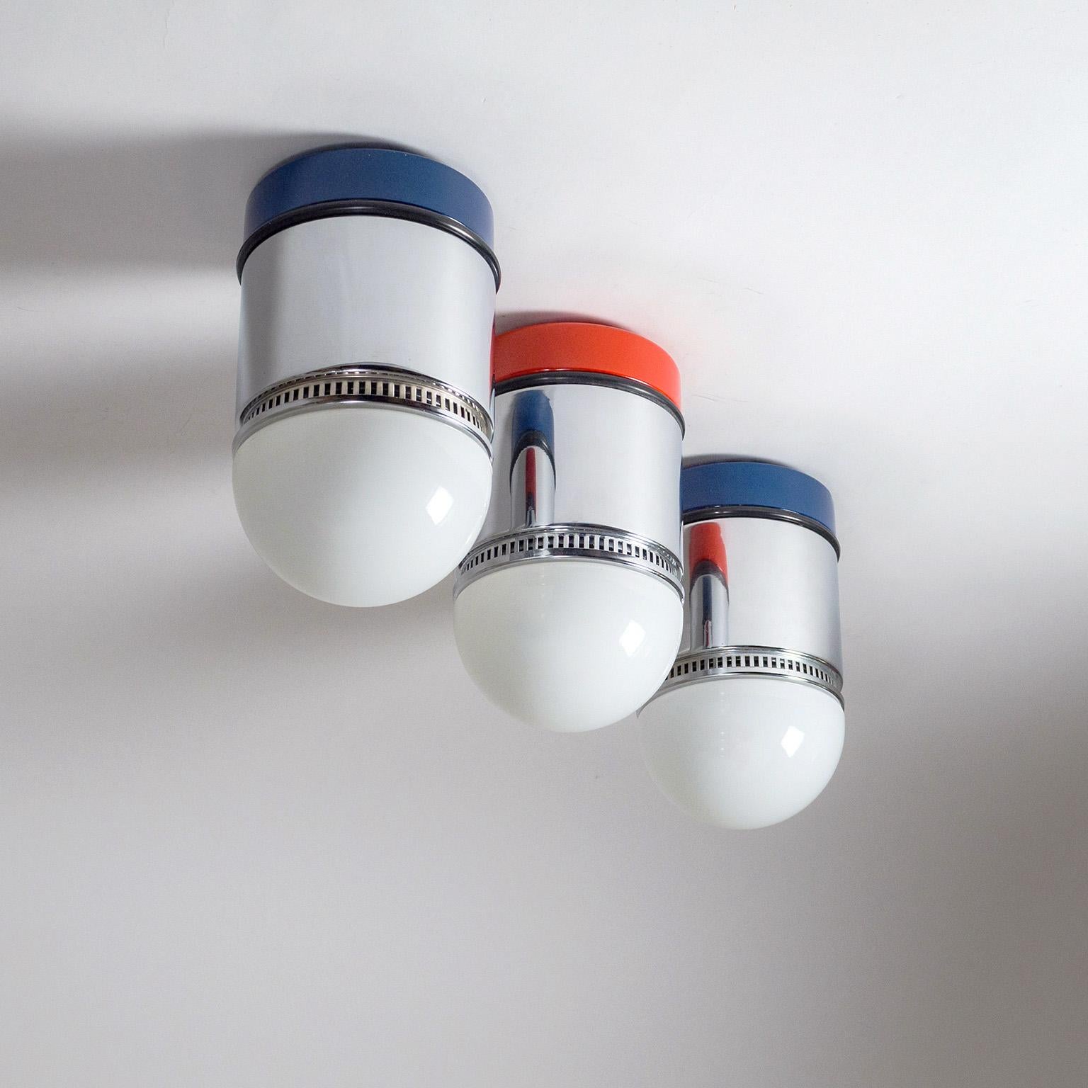 Set of three Postmodern ceiling lights designed by Gianni Celada for Fontana Arte, 1980. These model ‚Sisten‘ flush mounts are made of chromed and lacquered steel with opaline glass diffusers. Very good original condition with minimal wear. One