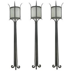 Three French Mid-Century Wrought Iron Floor Lamps Attributed to Raymond Subes