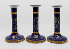 Drei Kerzenständer aus Gien-Porzellan