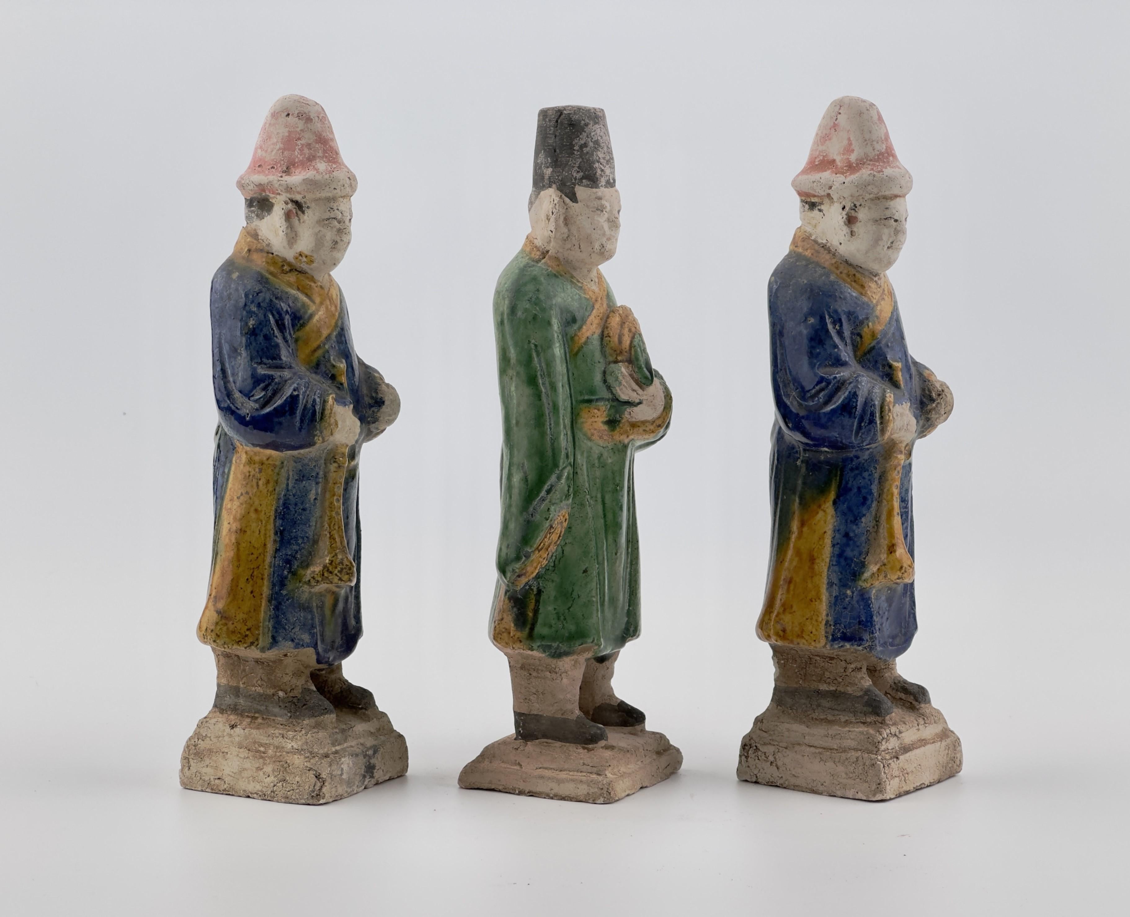 Statues of Chinese musicians crafted from terracotta, featuring glazes in green, blue with nice condition. Set on rectangular bases. Compared to other figures, musician figures are relatively rare, two figures with distinctive instrument from that