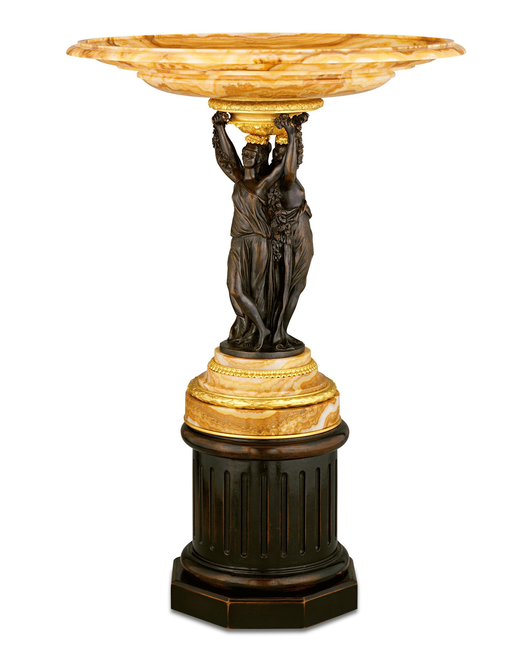 This exceptional early 19th-century centerpiece is crafted of exquisite Alabastro Fiorito marble and bronze. Alabastro Fiorito was one of the most prestigious marbles, used widely in Roman architecture and ornamentation. Beloved for its distinct