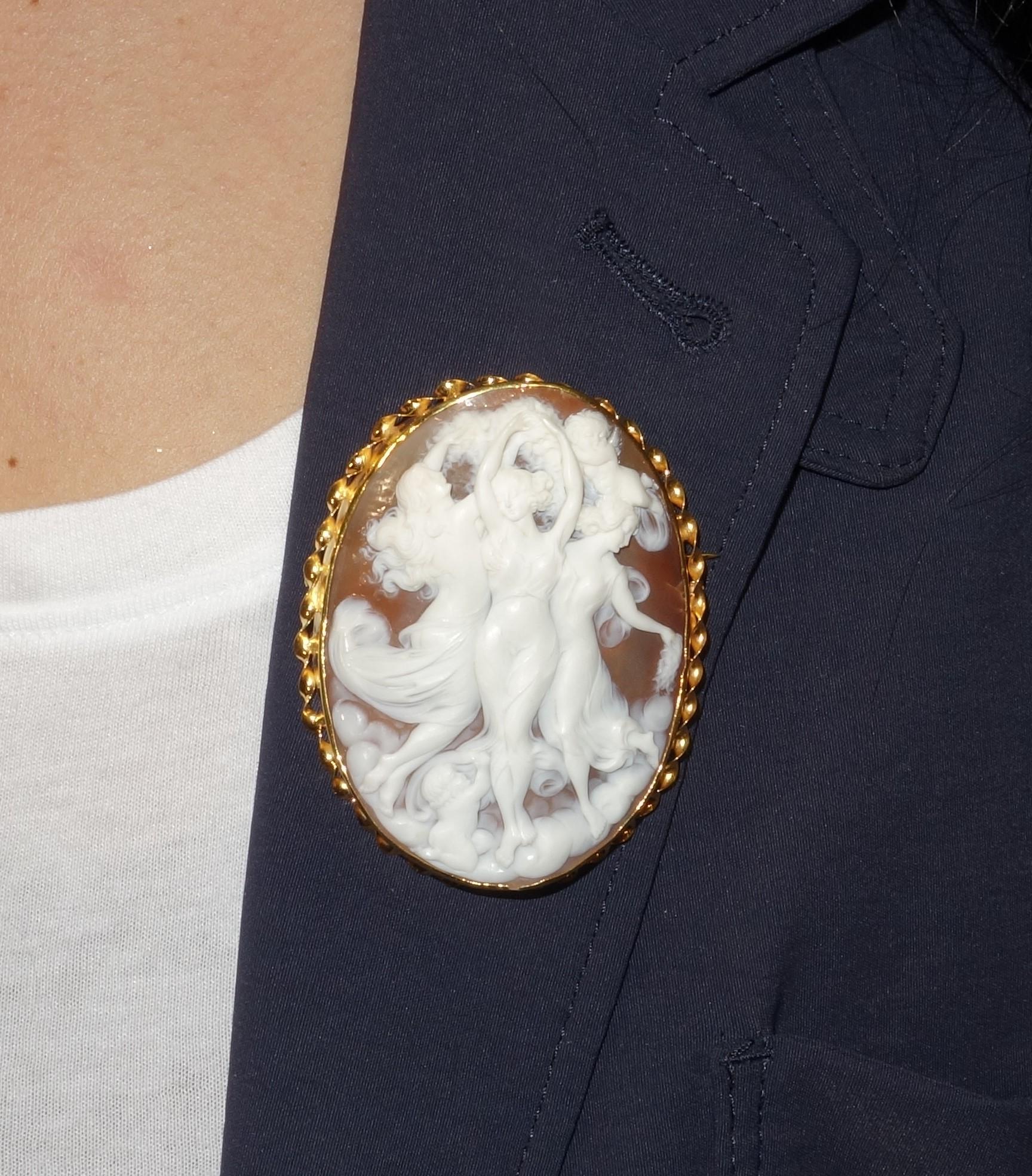 Elegant & Stylish Antique Cameo Brooch Pendant depicting The Three Graces; Beautifully Hand Carved in High Relief Estate piece; Meticulously artisan engraved with exquisite detail, this romantic natural carnelian shell cameo is set in a Beautiful