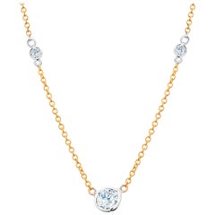 Three Graduating Bezel-Set Diamonds Yellow and White Gold Pendant
