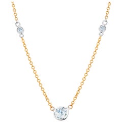 Three Graduating Bezel-Set Diamonds Yellow and White Gold Pendant