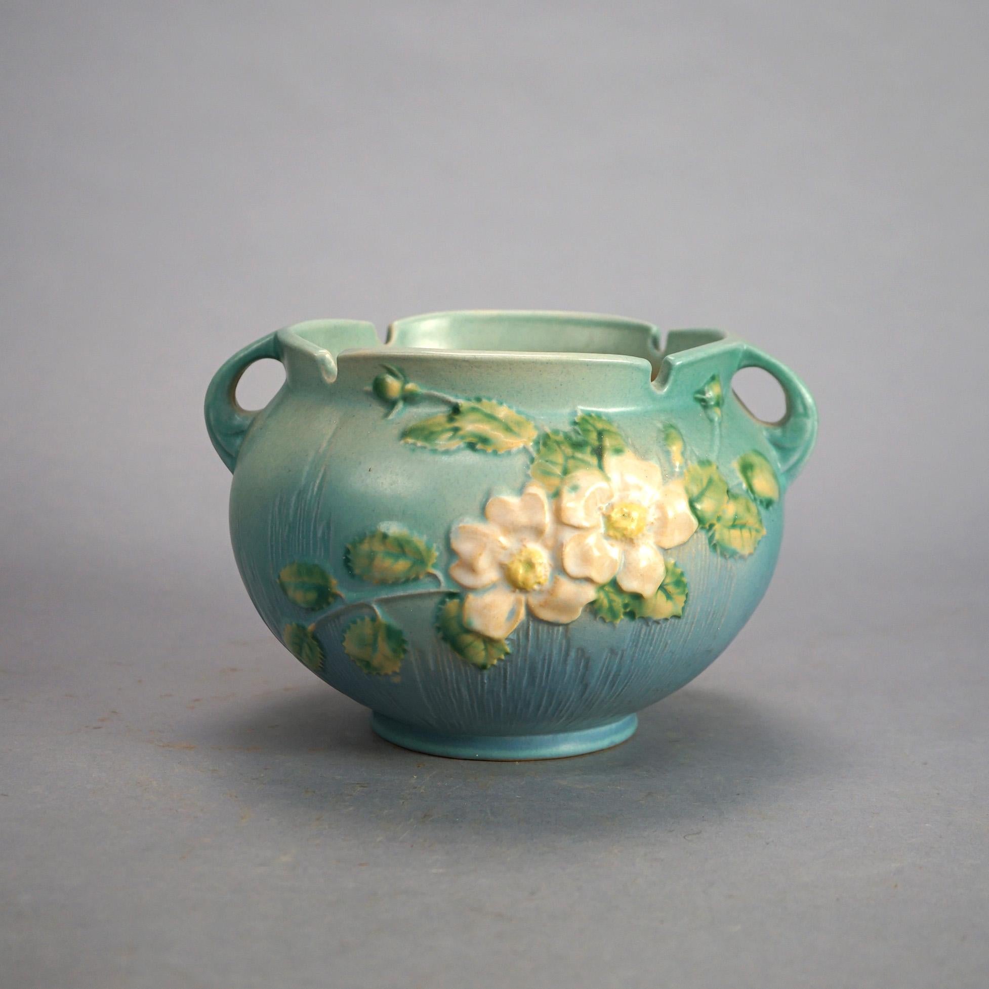 Three Green Roseville Art Pottery with Peony Pattern Mid 20thC

Measures- Vase with Handle: 10.25''H x 9.25''W x 5''D