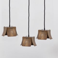 Three hammered ceiling lamps attributed to Tommaso Barbi - Italy, 1970s