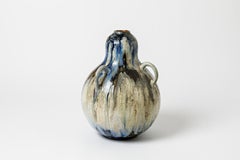 Three-handled glazed stoneware coloquint vase by Roger Guérin, circa 1930-1940.