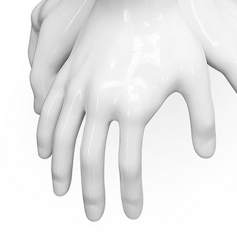 white ceramic hands