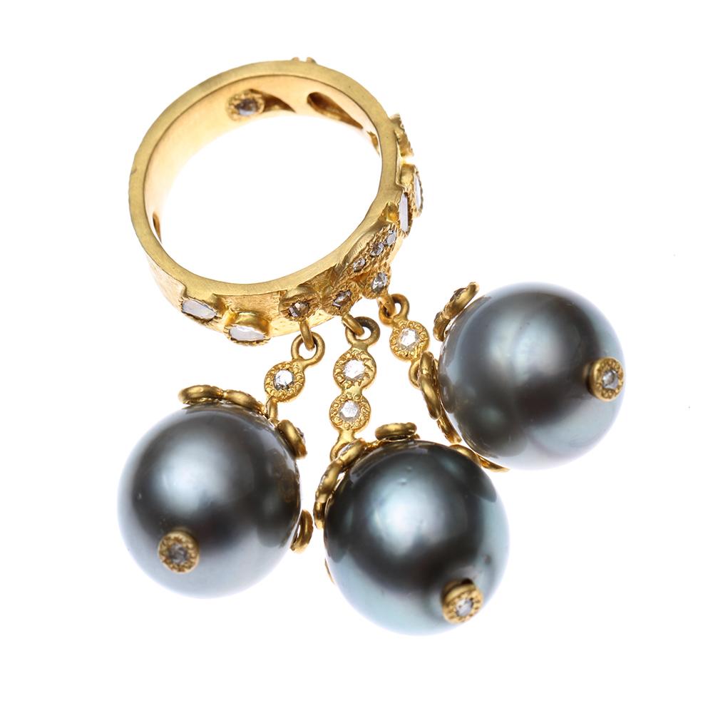 Affinity Ring set in 20 karat Yellow Gold with three hanging Tahitian 56.55-carat Gray Pearls and 1.74-carat Diamonds. This is a special ring because it comes with three yellow gold chain-linked pearls with faceted diamonds surrounds it.

Custom