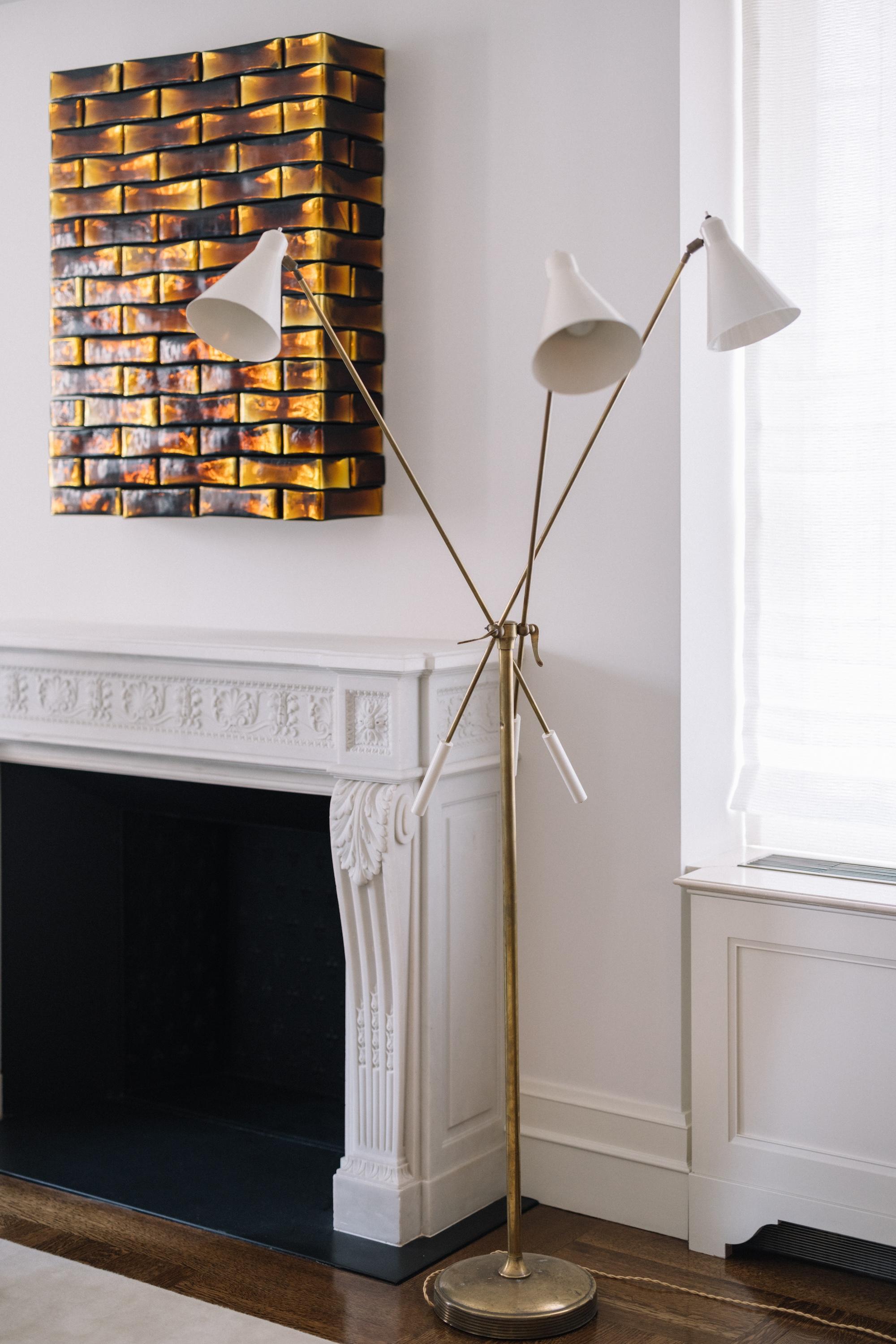 Origin
Italy, circa 1950s

Materials
Brass and aluminum

Dimensions
72.8 in x 35.4 in (185 cm x 90 cm)

Condition
Good vintage condition

A striking embodiment of mid-century Italian lighting, this three-headed floor lamp from the 1950s reflects the
