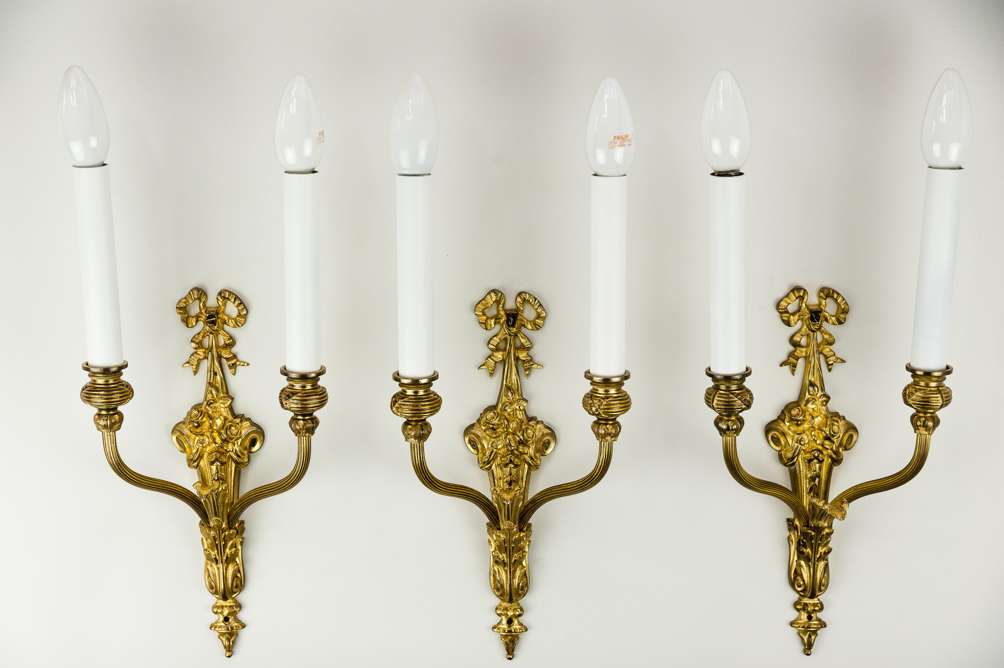 Three historistic wall lamps, circa 1890s
Fire gilded
Original condition.