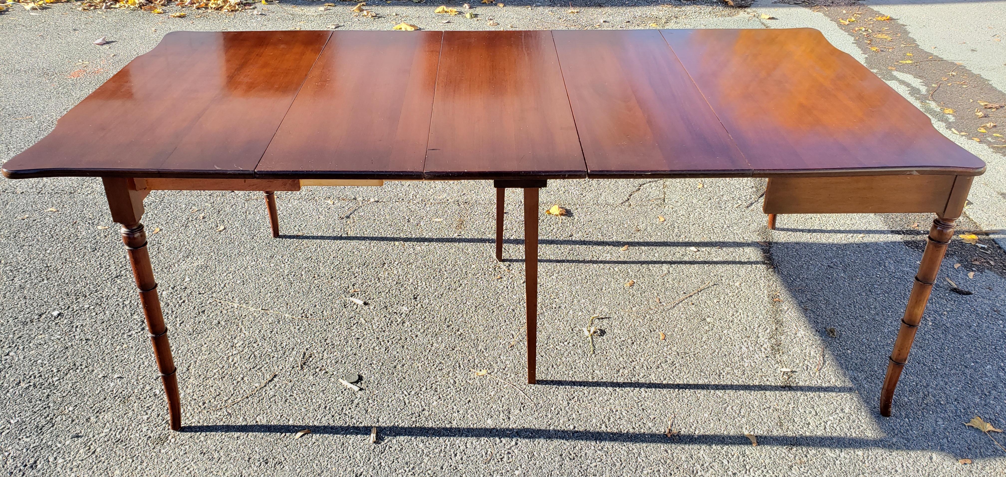 Beautiful and versatile solid walnut table. Very elegant console table. Flip the top Open to unveil a square game table. Pull slides open to insert one, two or 3 leaves for a beautiful full sized dining table or occasional buffet table. This table