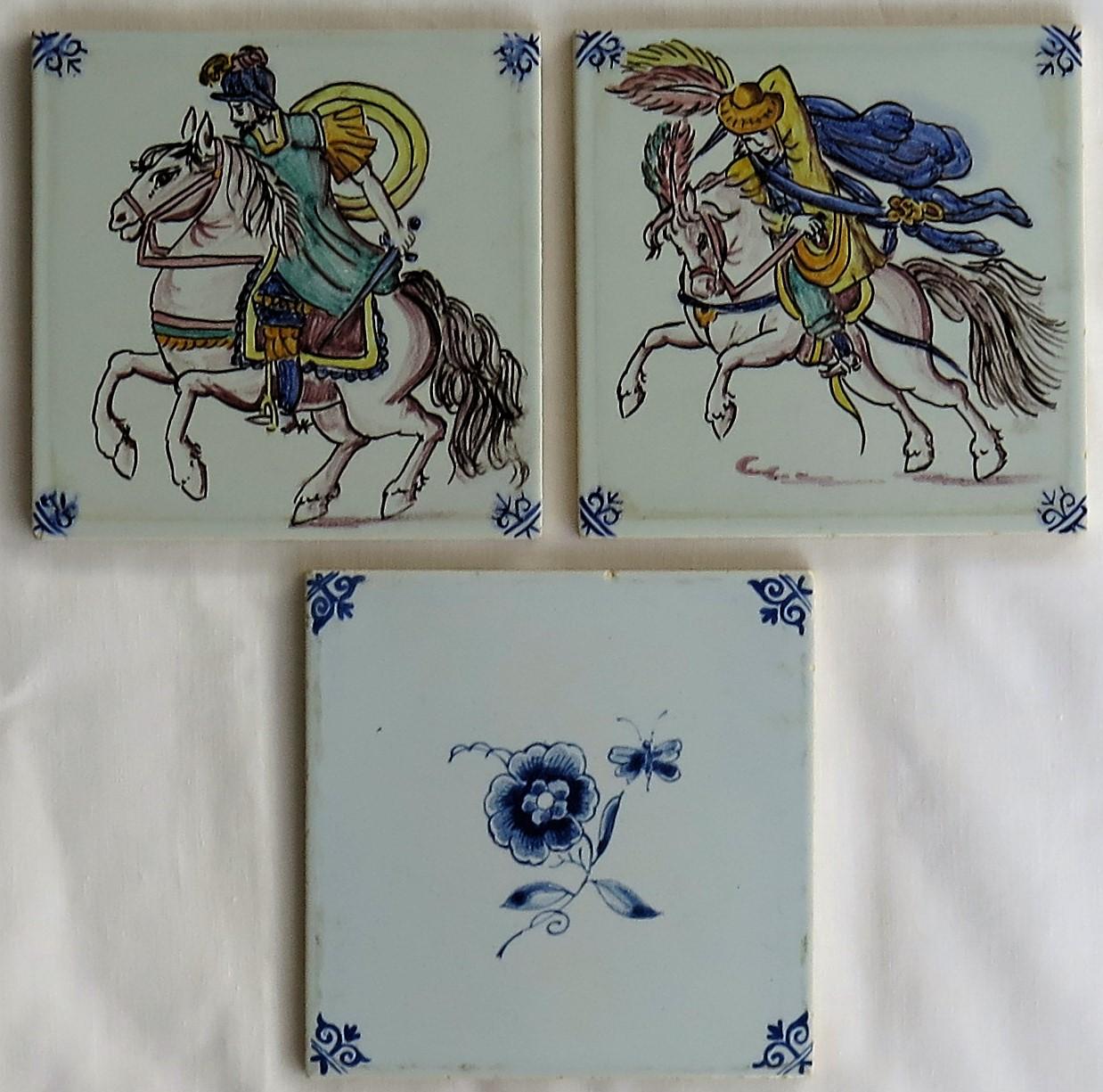These are three attractive, hand painted, Dutch (Netherlands), delft ceramic wall tiles, dating to the early / mid-20th century, circa 1950s

All tiles are nominally 5 inches square and 5/16 inches thick. 

The tiles all look to be hand painted,
