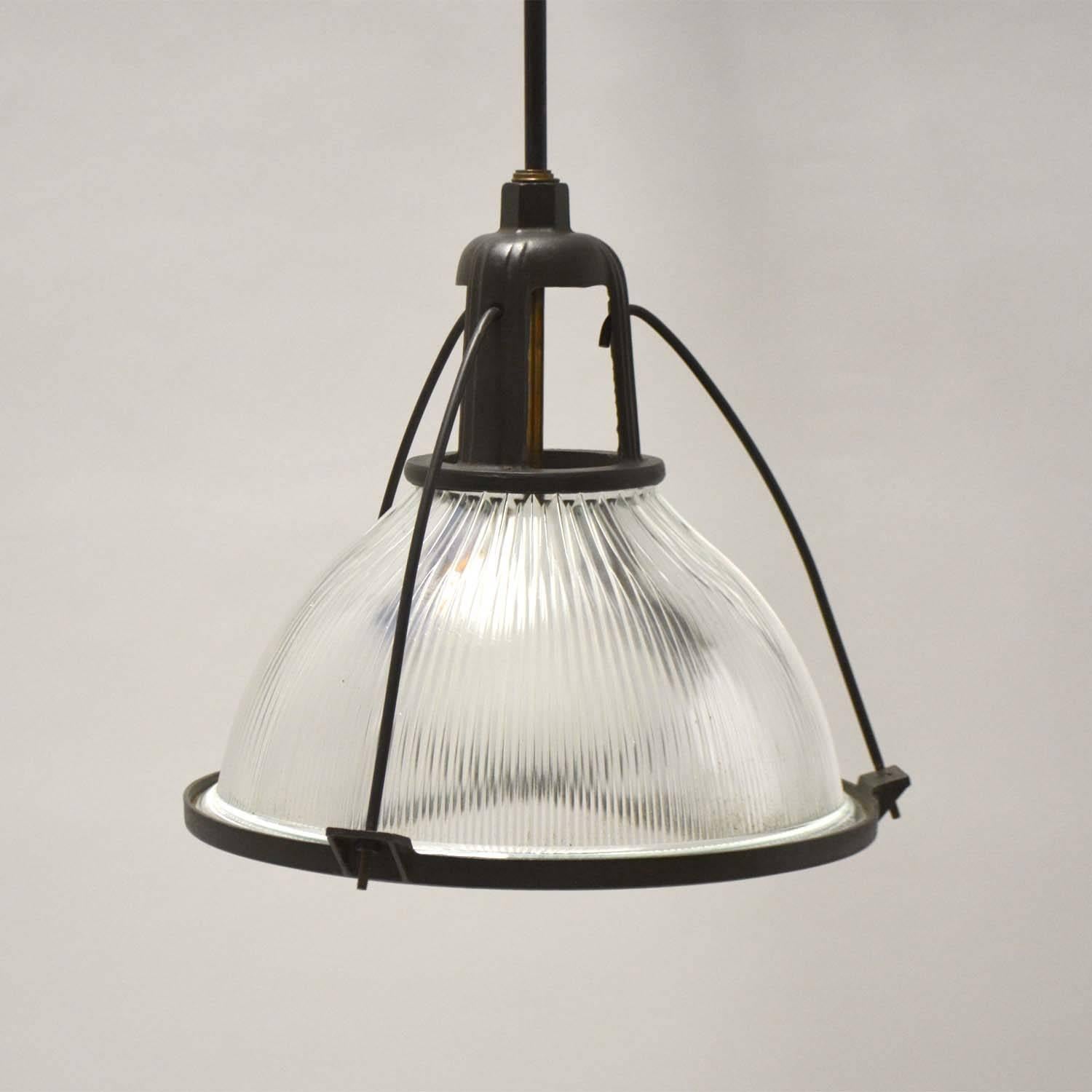 Three vintage industrial holophane pendants, with original Fresnel glass, refurbished with a dark burnished bronze finish.
Priced individually.