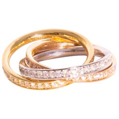 Three Interlocking Diamond and Three-Tone 18 Carat Gold Rings