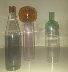 Three Italian Bottles in Blown Glass Colored in Pink Green Grey Orange, Milano