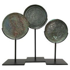 Three Khmer Bronze Mirrors, 14th - 15th Century
