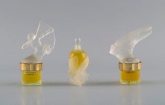 Three Lalique Perfume Bottles. Late 20th Century