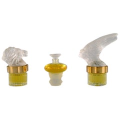 Tres frascos de perfume Lalique, finales del siglo XX
