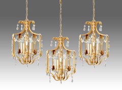 Three Large and Elegant Lanterns in Gold and Silver Metal with Crystals