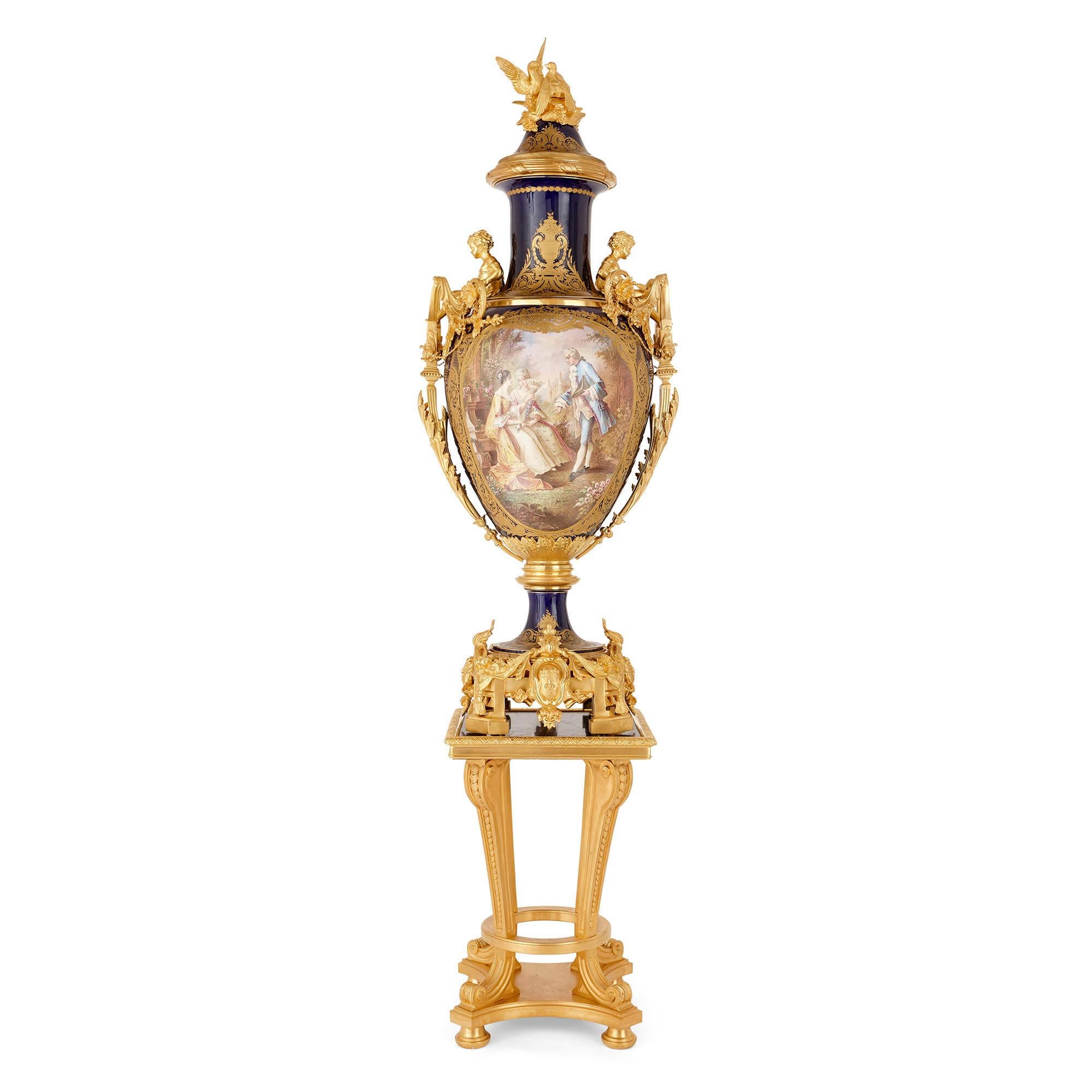 This impressive and important collection of three Sèvres style vases forms a remarkable group. The three vases, while not constituting a matching set, combine to create a group strikingly similar in style and composition. The fact that the largest