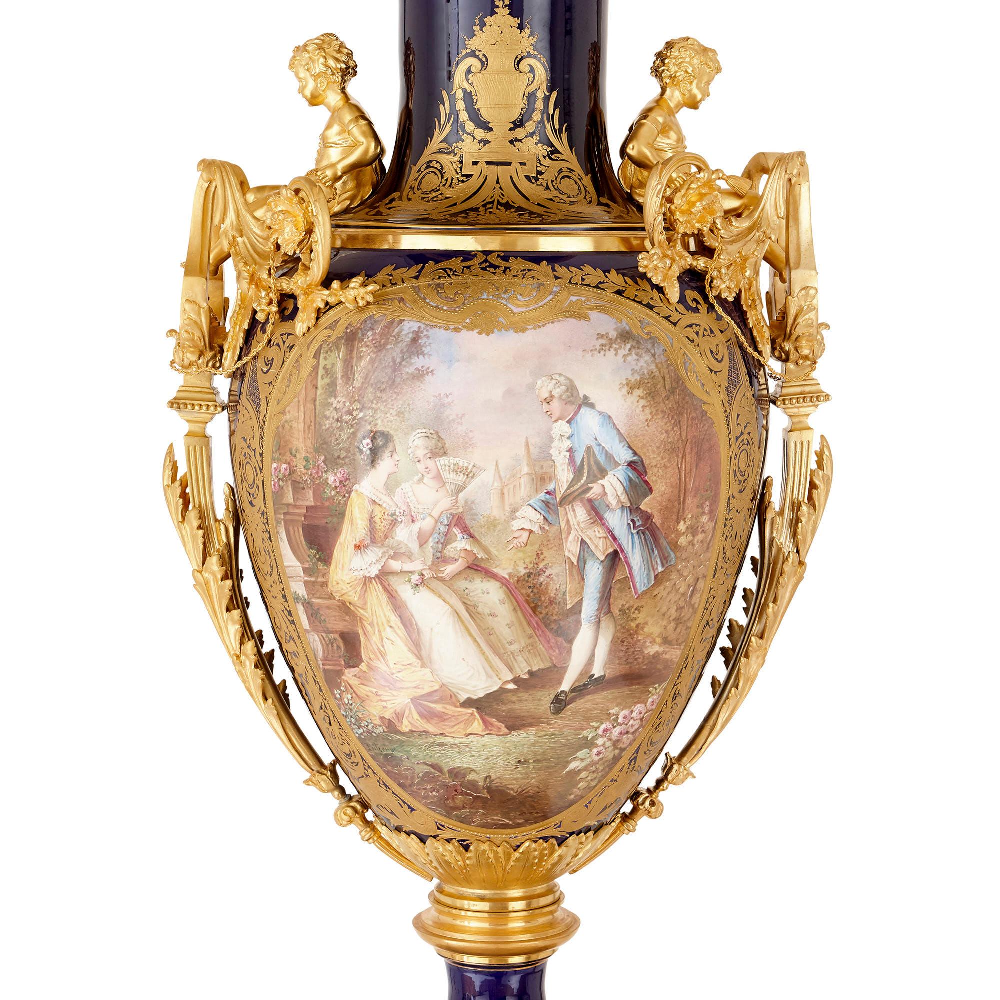 Louis XVI Three Large Sèvres Style Porcelain Vases with Gilt Bronze Pedestals