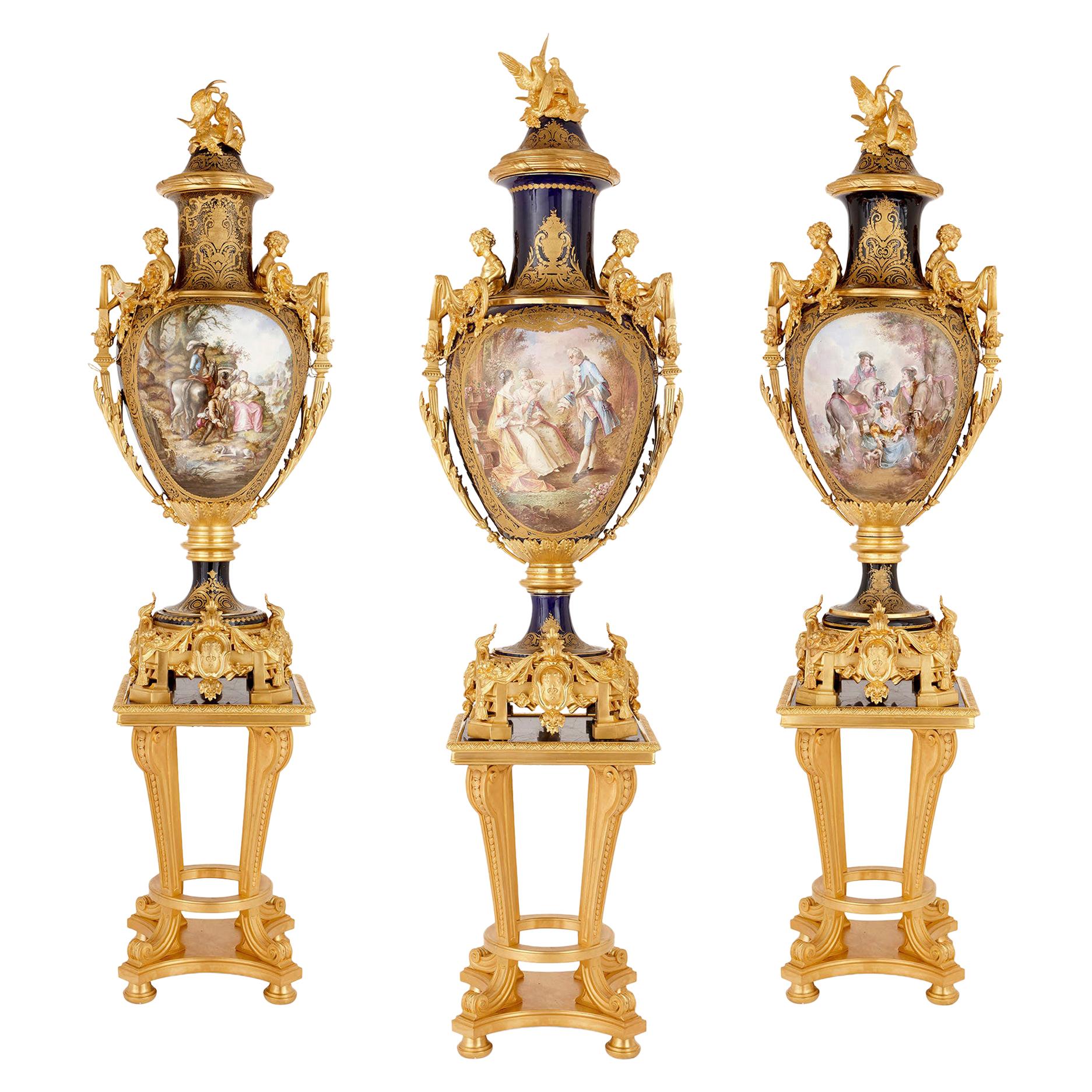 Three Large Sèvres Style Porcelain Vases with Gilt Bronze Pedestals