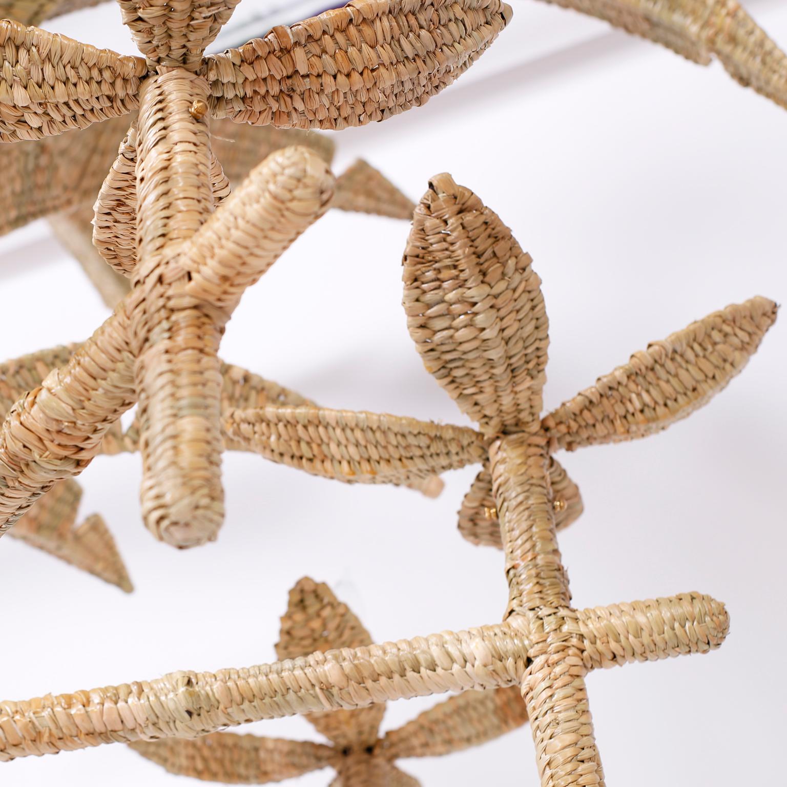 Three Large Wicker Palm Leaf Chandeliers 1