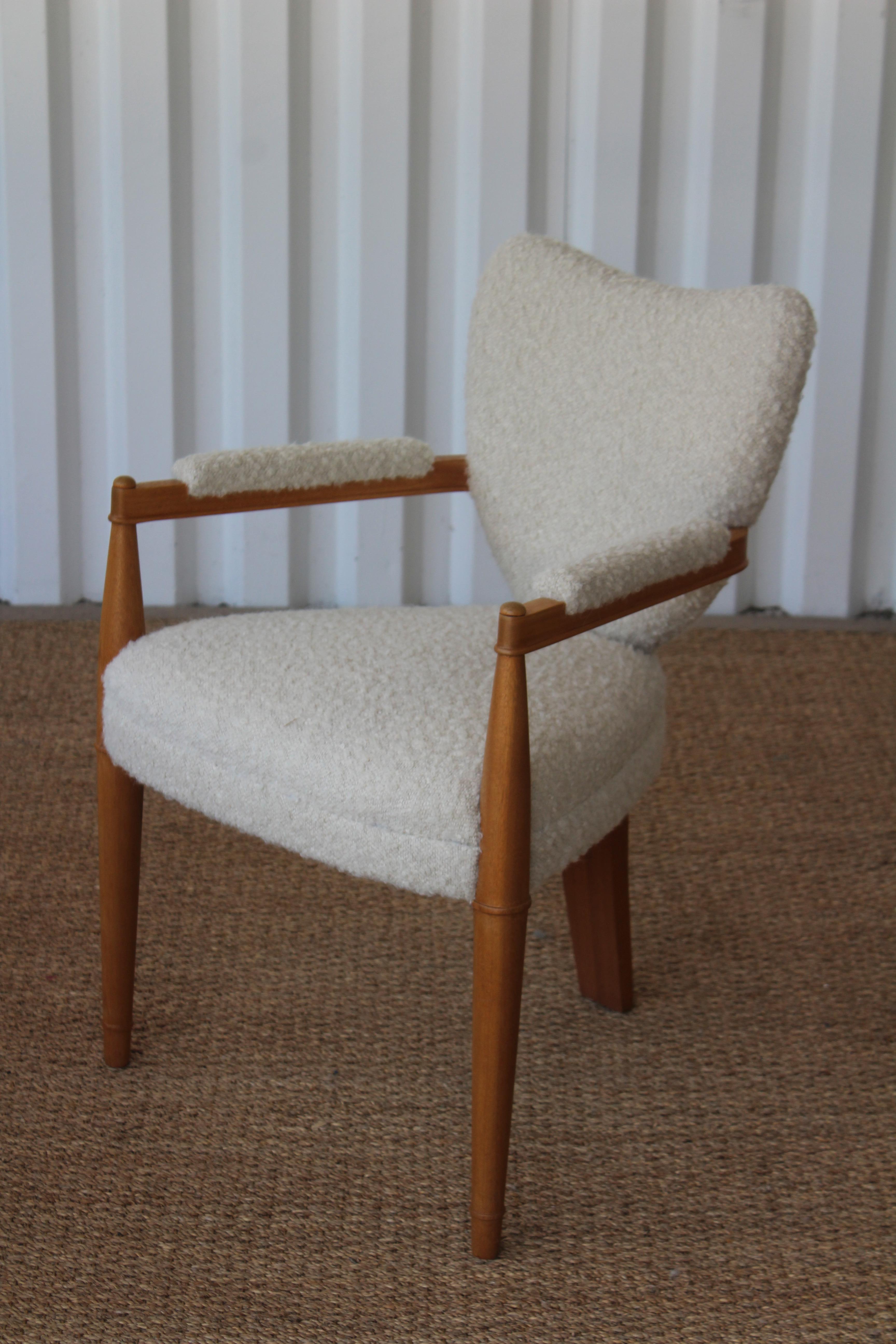 Vintage 1940s three legged armchair. This chair has been restored with new alpaca wool upholstery and a refinished oak frame. Armheight is 24.5 inches.