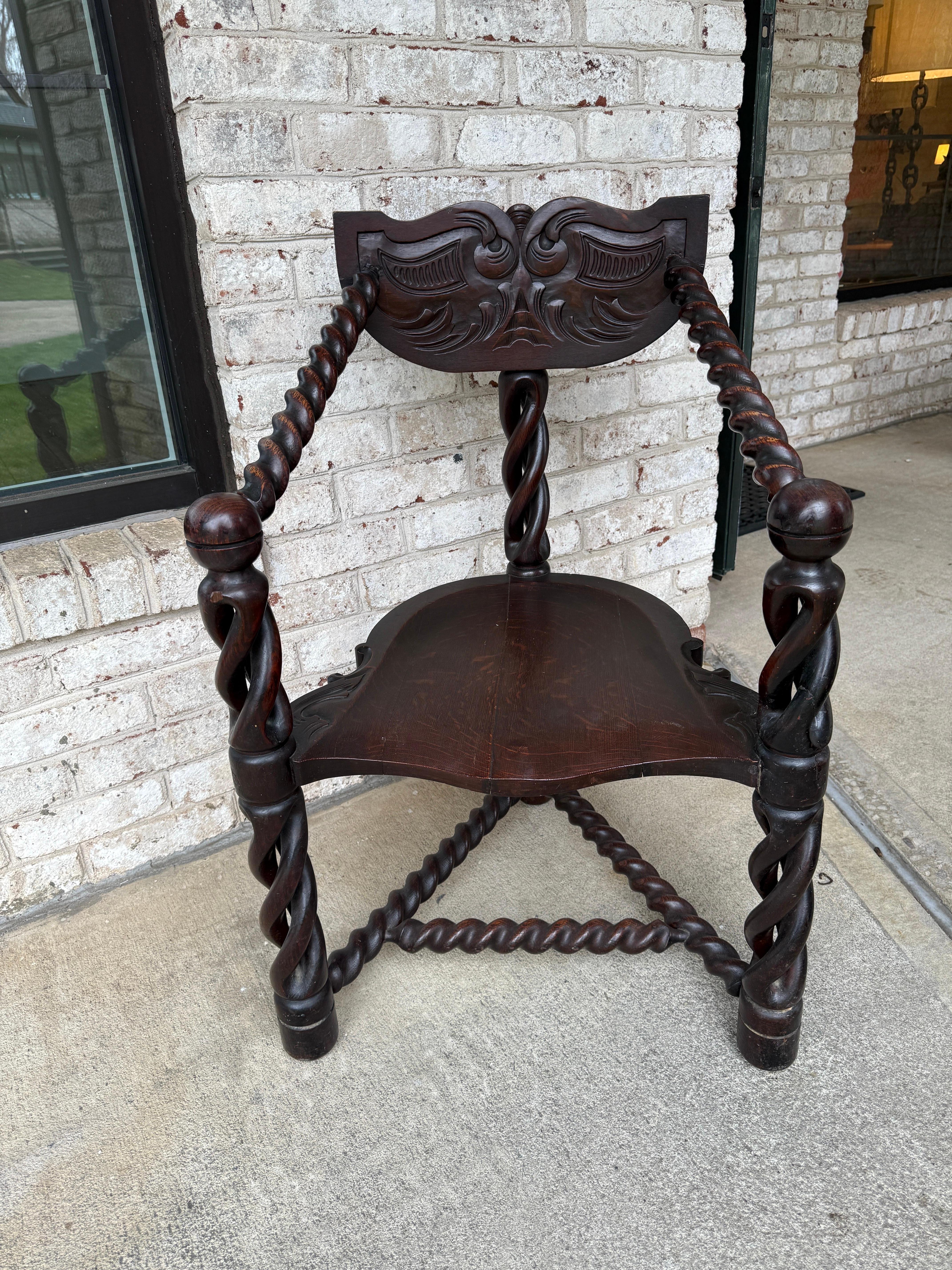 This exceptional accent chair is attributed to RJ Horner and Company of New York City known for their superior wood quality and superior craftsmanship featuring distinctive carved elements. Manufactured circa 1890, this three-legged accent chair in