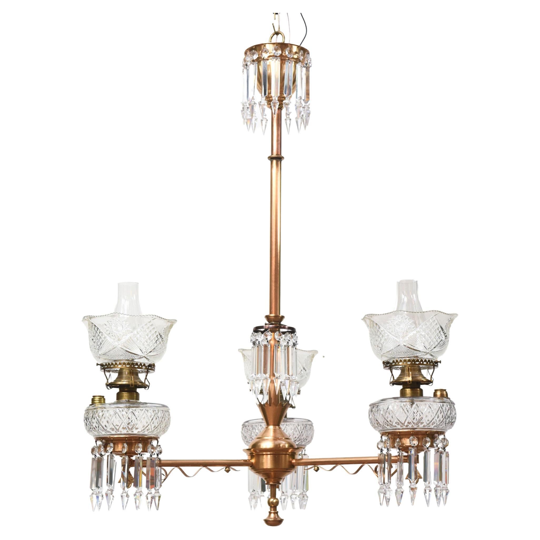 Three Light Aesthetic Movement Red Brass and Crystal Chandelier For Sale