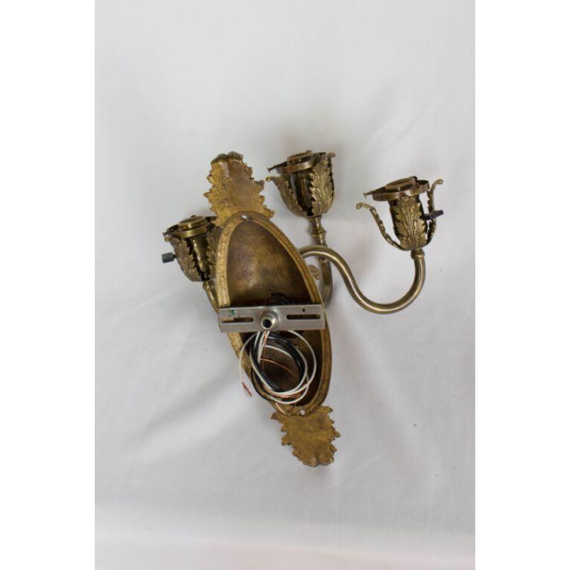 Can be used with or without glass shades. Glass sold separately the glass pictured is $45 a piece.

Material: Brass
Style: Traditional
Place of Origin: United States
Period made: Early 20th Century
Dimensions: 15 × 11 × 15 in
Condition