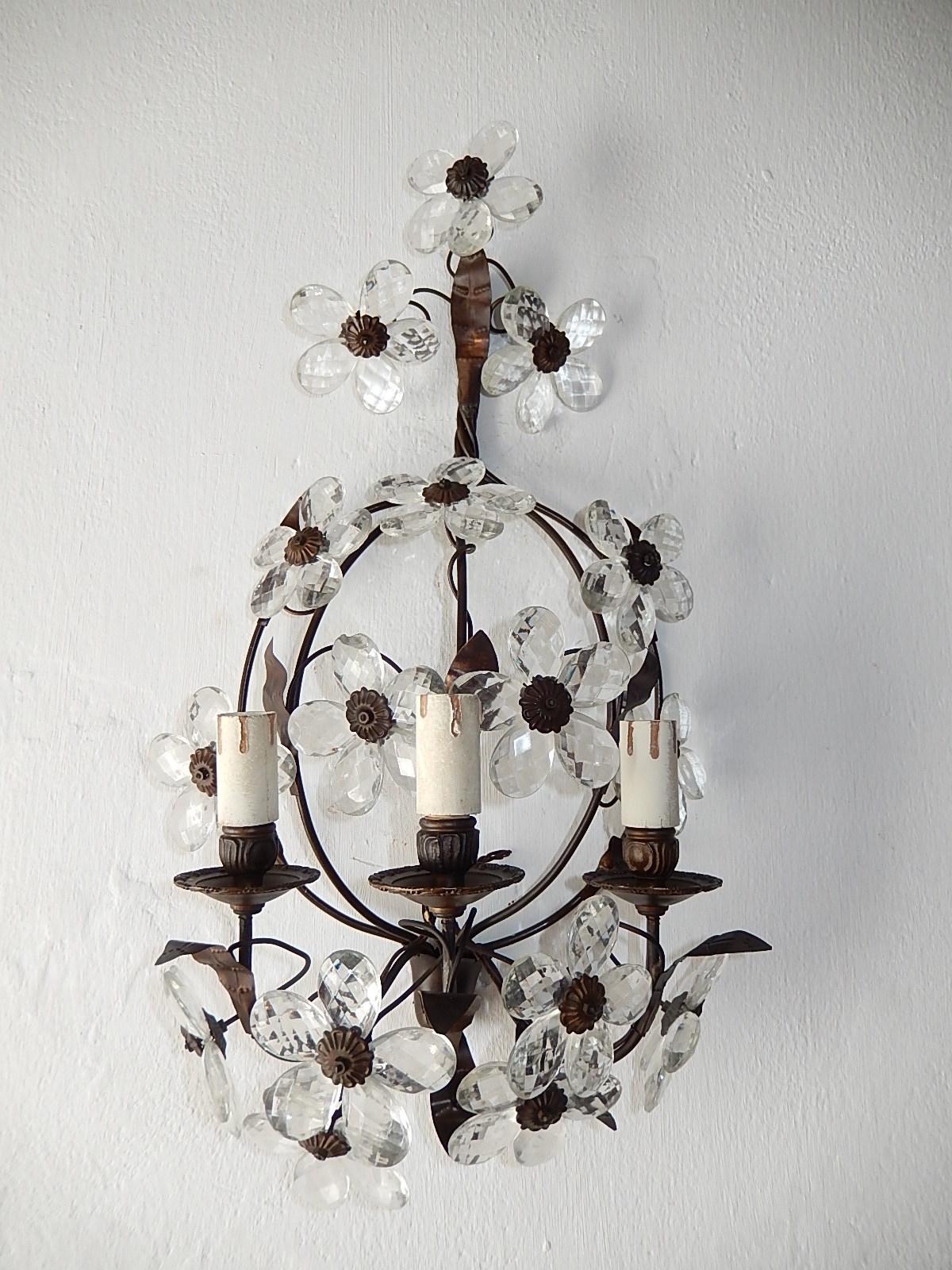 Housing three lights each, rewired and ready to hang. Bronze with tole leaves with perfect patina. Adorning clear prism flowers. Free priority shipping from Italy.