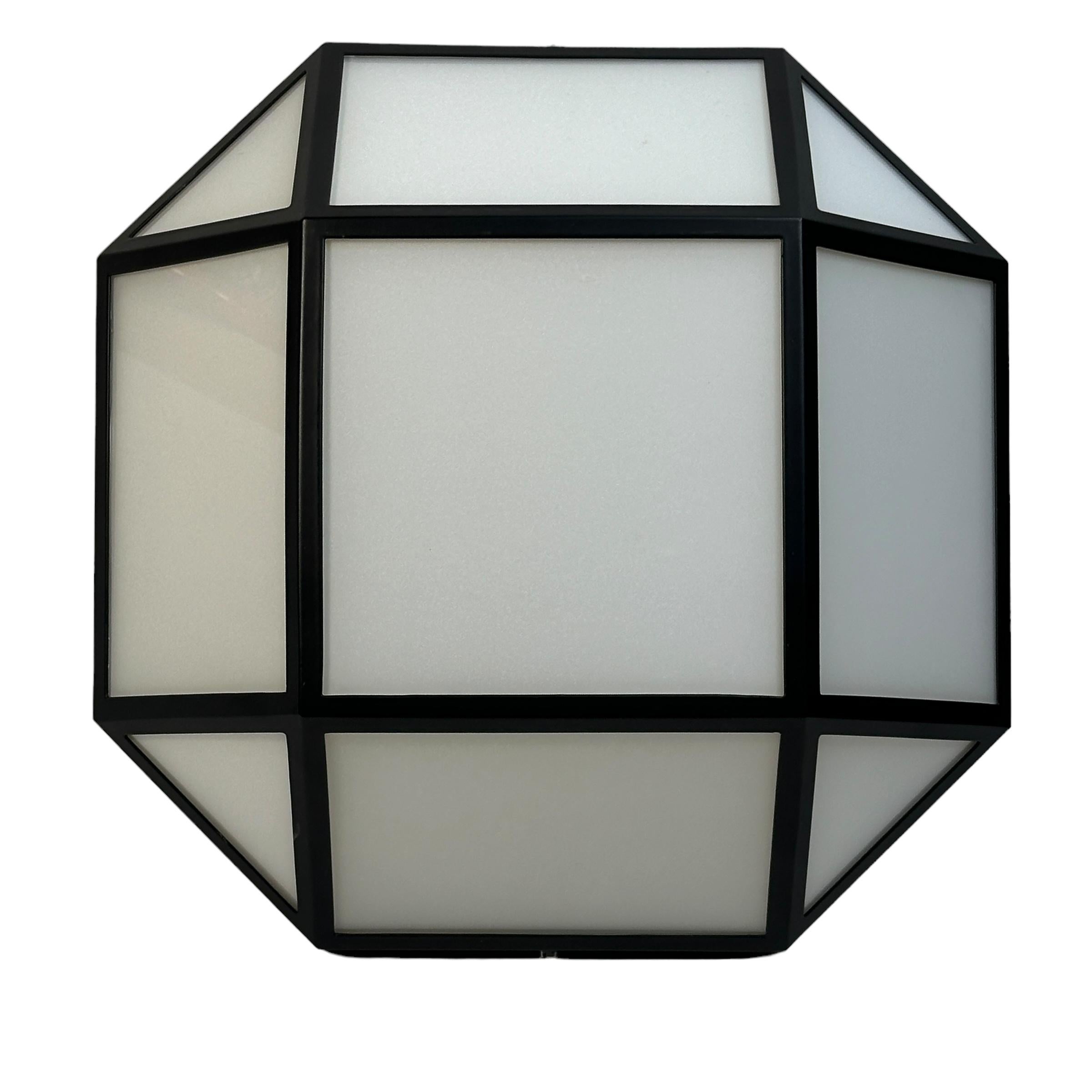 Elegant Austrian modern wall light, with metal caged milk glass and mounted on white lacquered metal base. Manufactured by Eglo Leuchten in the 1980s. This fixture requires three European E14 lightbulbs, up to 40 watts each. If Lightbulbs pictured,