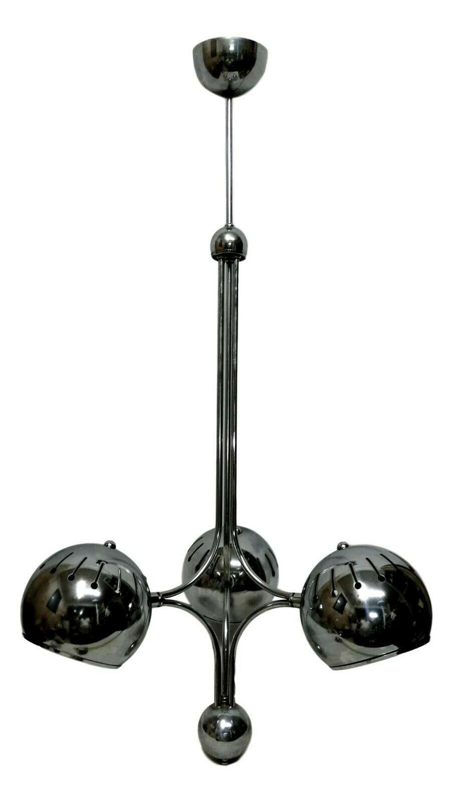 original 70s steel chandelier with three lights, Goffredo Reggiani production

composed of a central axis and three spheres, in the Classic Reggiani style, which can rotate at will to direct the light beam

it measures one meter in height, for a