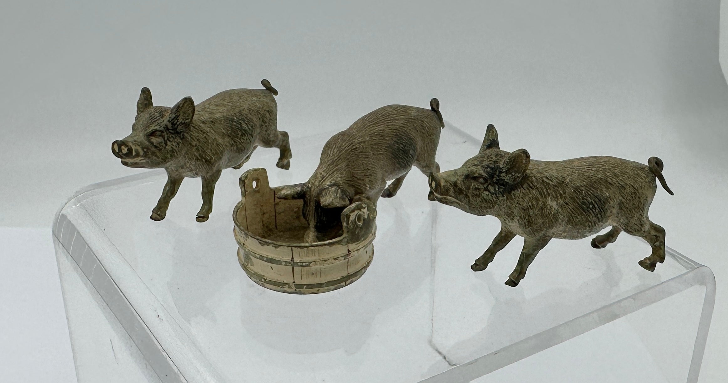 THIS IS A SUPERB SET OF THREE LITTLE PIGS BRONZES.  THE PIGS ARE ANTIQUE AUSTRIAN VIENNA BRONZES.
These wonderful antique Austrian Vienna Bronzes (Bronze de Vienne, Wiener Bronze, Cold Painted Bronze) date to circa 1900.  The bronzes are of the