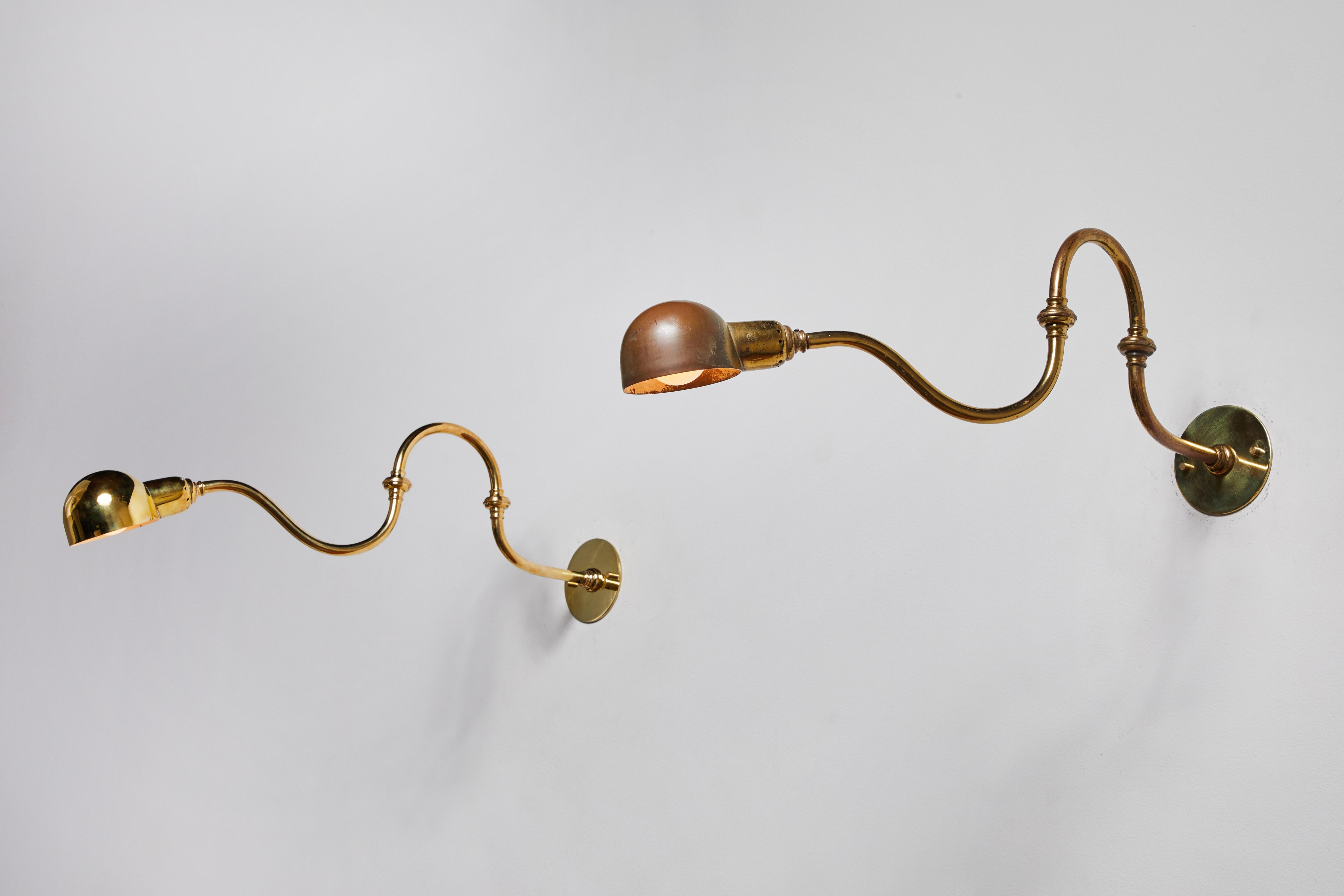 Three LP15 Tromba sconces by Luigi Caccia Dominioni for Azucena. Designed and manufactured in Italy, 1964. Brass, custom brass backplate. Rewired for U.S. junction box. Arms and shades adjust to various positions. Each light takes one E27 75W