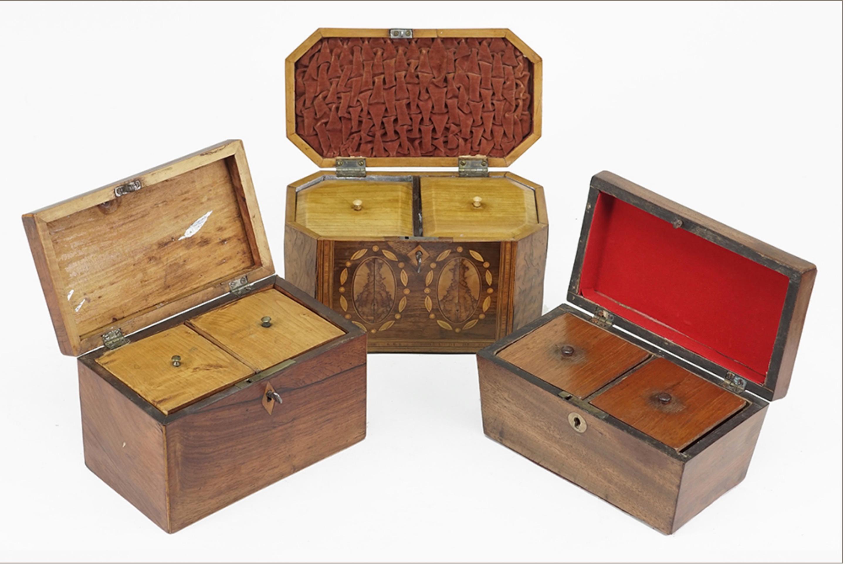 Three mahogany and inlaid wood tea caddy. Consisting of an inlaid tea caddy. Together with two additional mahogany tea caddies height 5 1/2