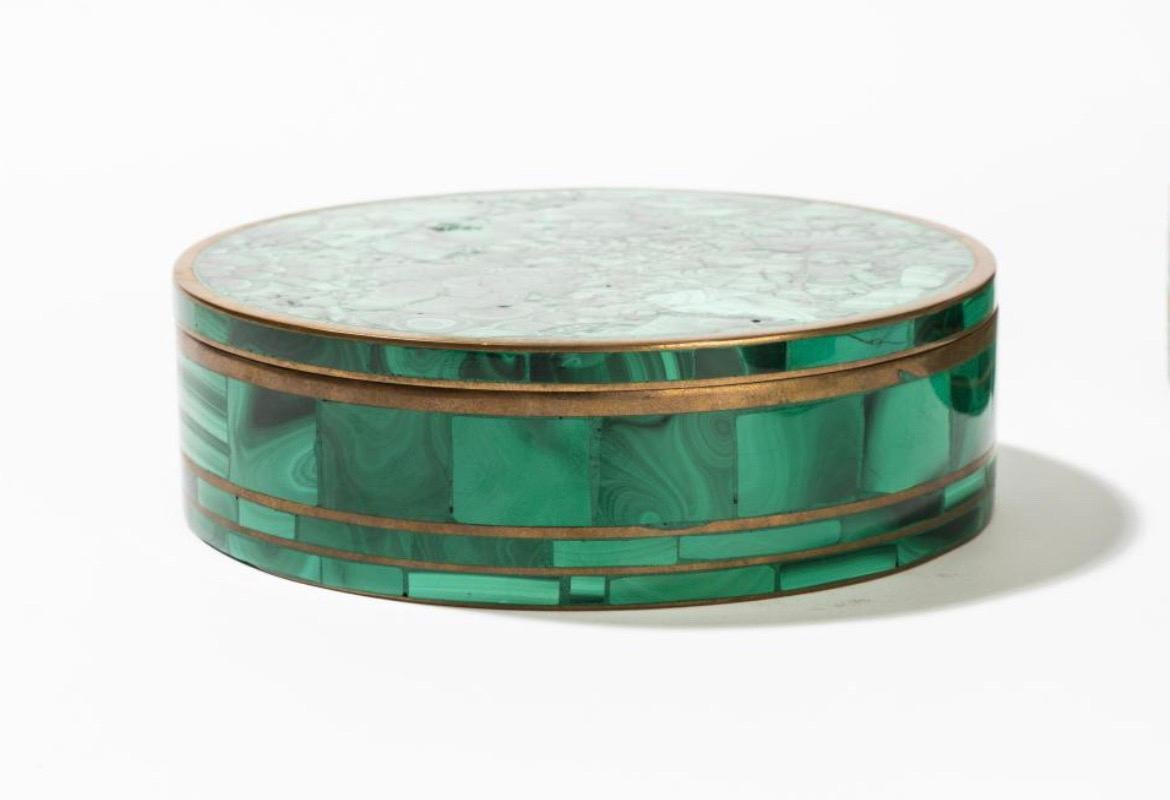 Set of three Malachite table boxes with brass mounts; ranging from 2 x 4 3/4 in. to 2 x 6 1/2 x 7 1/4 in. 

Provenance: 
Property from the Personal Collection of Beverly Hills Designer Barbara Lockhart.